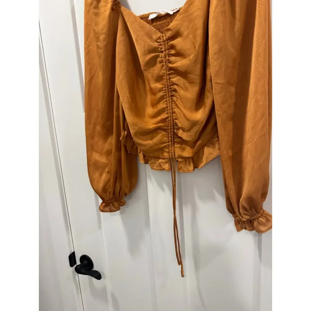 ASTR the label puff long sleeve adjustable scrunch burnt orange top